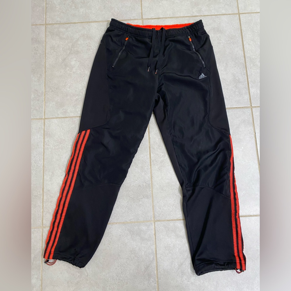 Black and Orange Adidas tracksuit pants